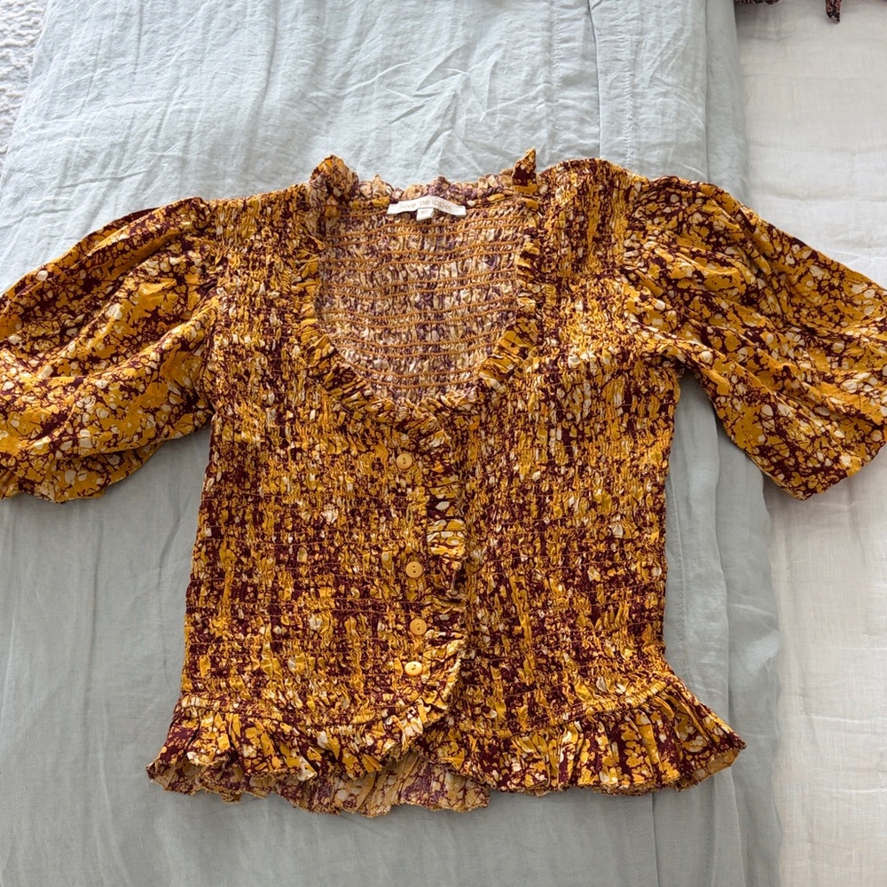 Love the label Anthropologie Abstract Smocked Blouse